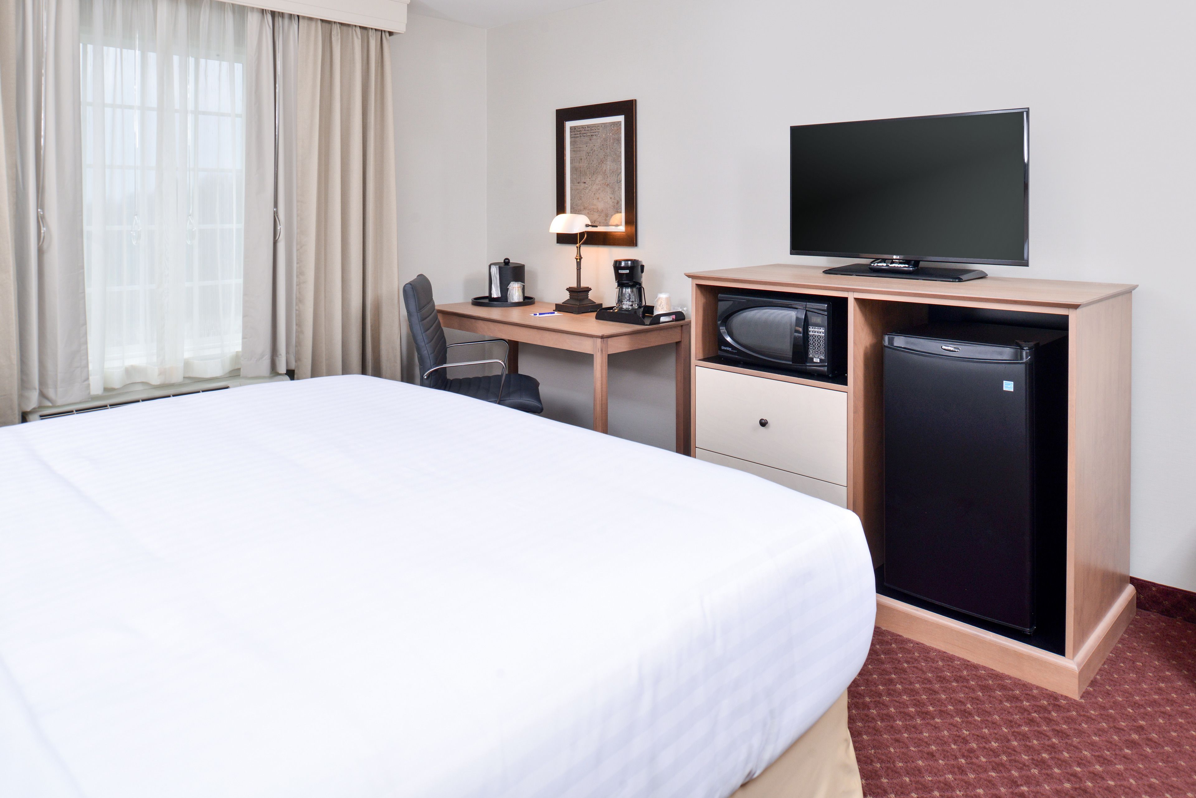 standard room, 1 king bed, accessible | in-room safe, desk, blackout curtains, iron/ironing board