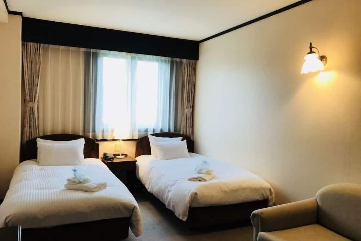 Desk, free WiFi, bed sheets