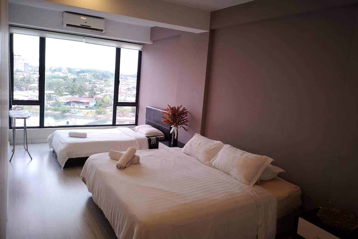 Suite, 2 camere da letto | Una scrivania, ferro/asse da stiro, Wi-Fi gratuito, lenzuola