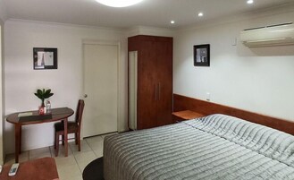 Deluxe Unit | Premium bedding, Select Comfort beds, individually furnished, desk