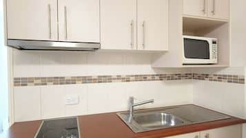 40-inch flat-screen TV with cable channels, TV