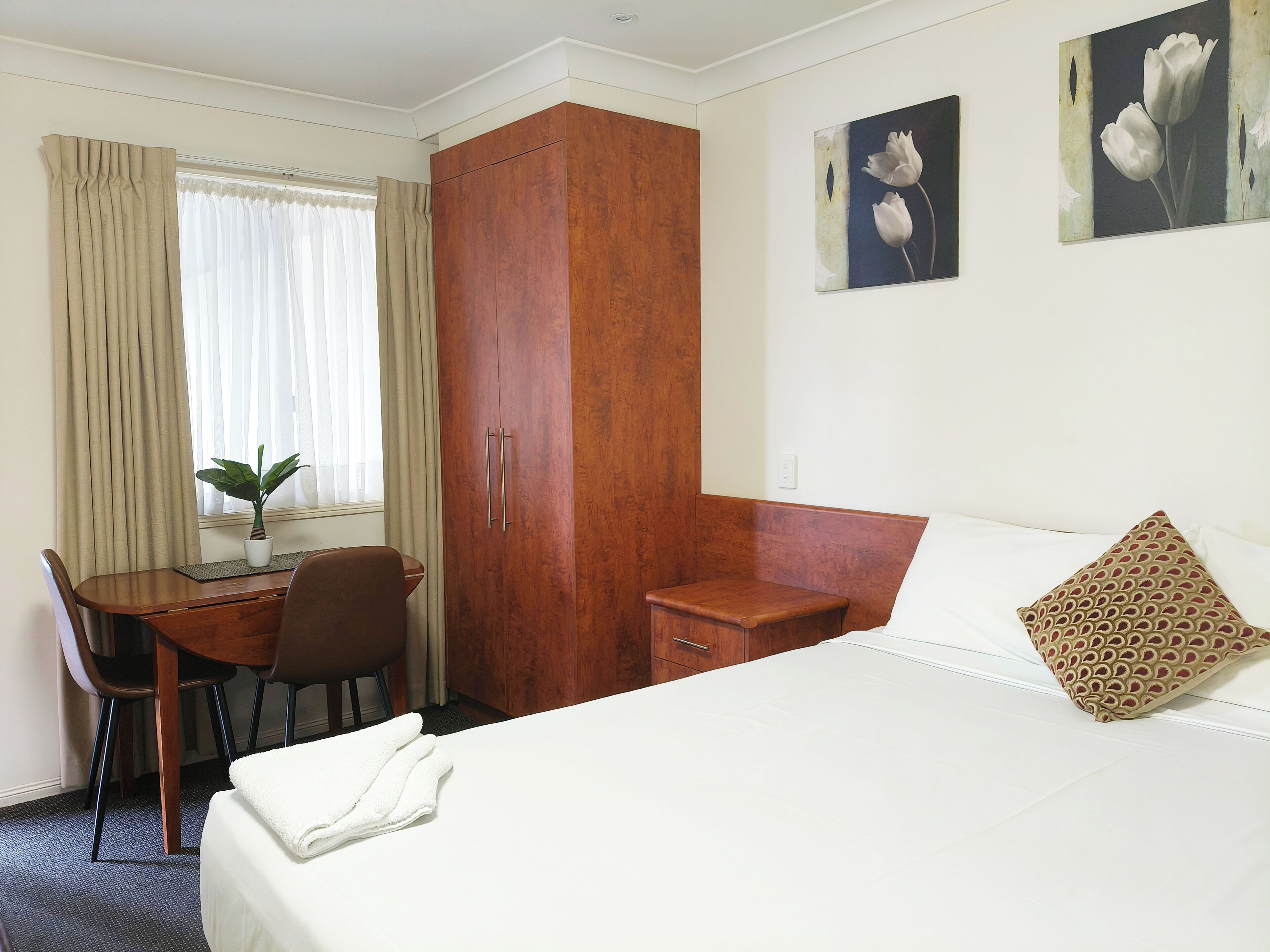 Premium bedding, Select Comfort beds, individually furnished, desk