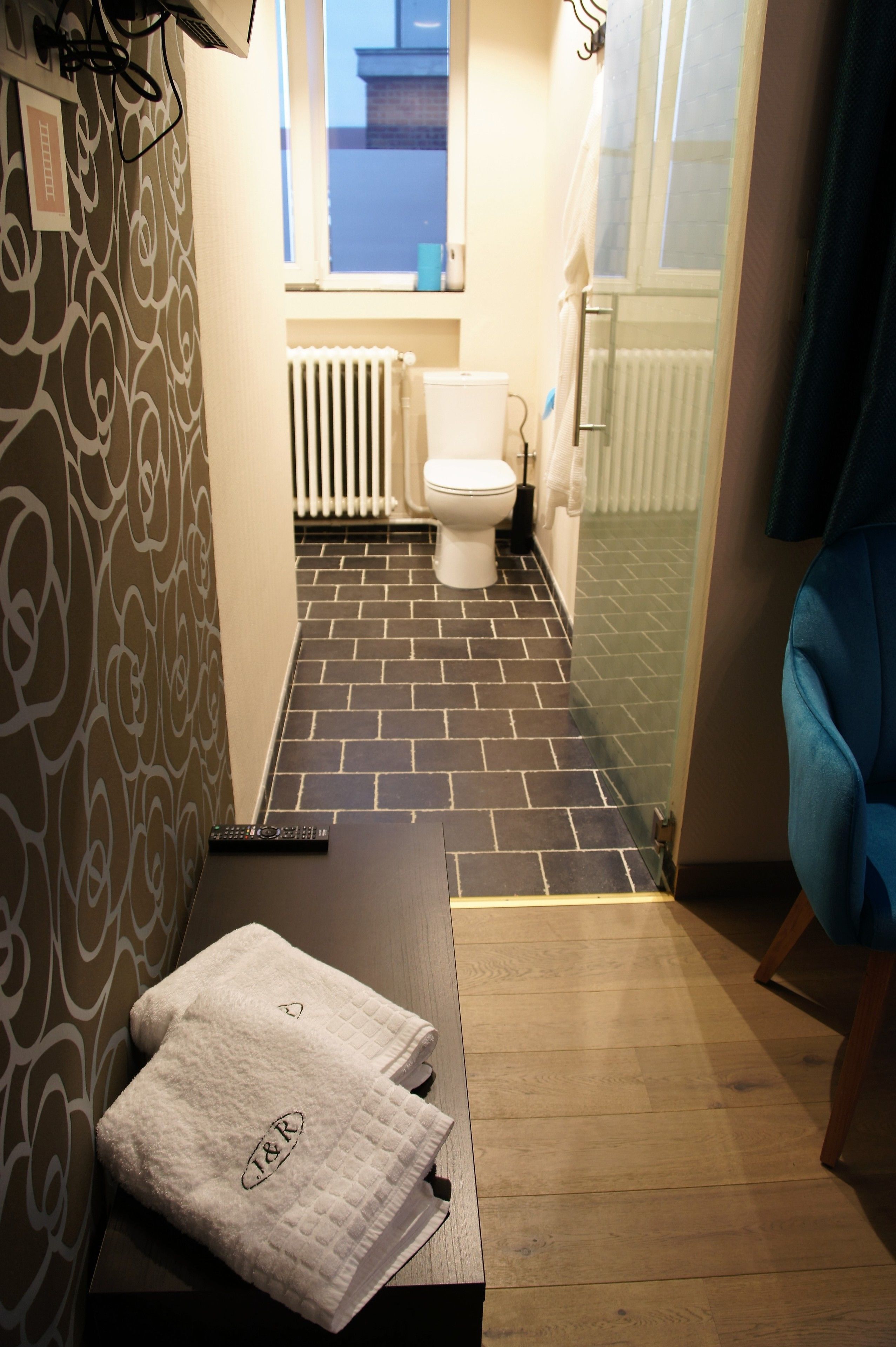 city apartment, 1 bedroom, non smoking, courtyard area | bathroom | shower, rainfall showerhead, free toiletries, bathrobes