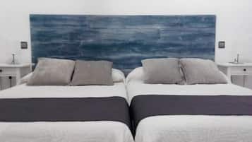 Blackout curtains, iron/ironing board, free cots/infant beds