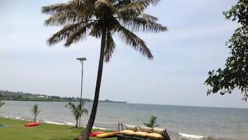 Private beach, white sand, beach umbrellas, beach towels