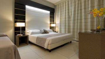 Familien-Dreibettzimmer | Hochwertige Bettwaren, Daunenbettdecken, Minibar, Zimmersafe