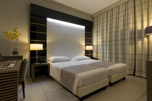 Hochwertige Bettwaren, Daunenbettdecken, Minibar, Zimmersafe