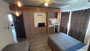 Suite estudio de diseñador | Ropa de cama de alta calidad, edredón, wifi gratis y ropa de cama