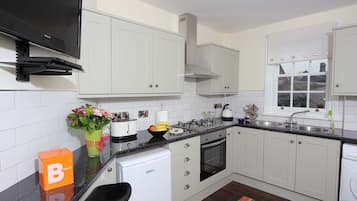 Luxury Apartment, 1 Bedroom (Brookes) | Living area | Flat-screen TV, DVD player, iPod dock