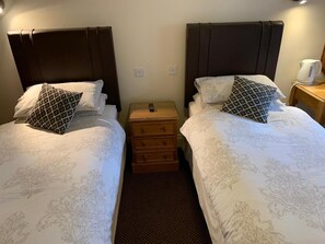 Desk, laptop workspace, iron/ironing board, rollaway beds