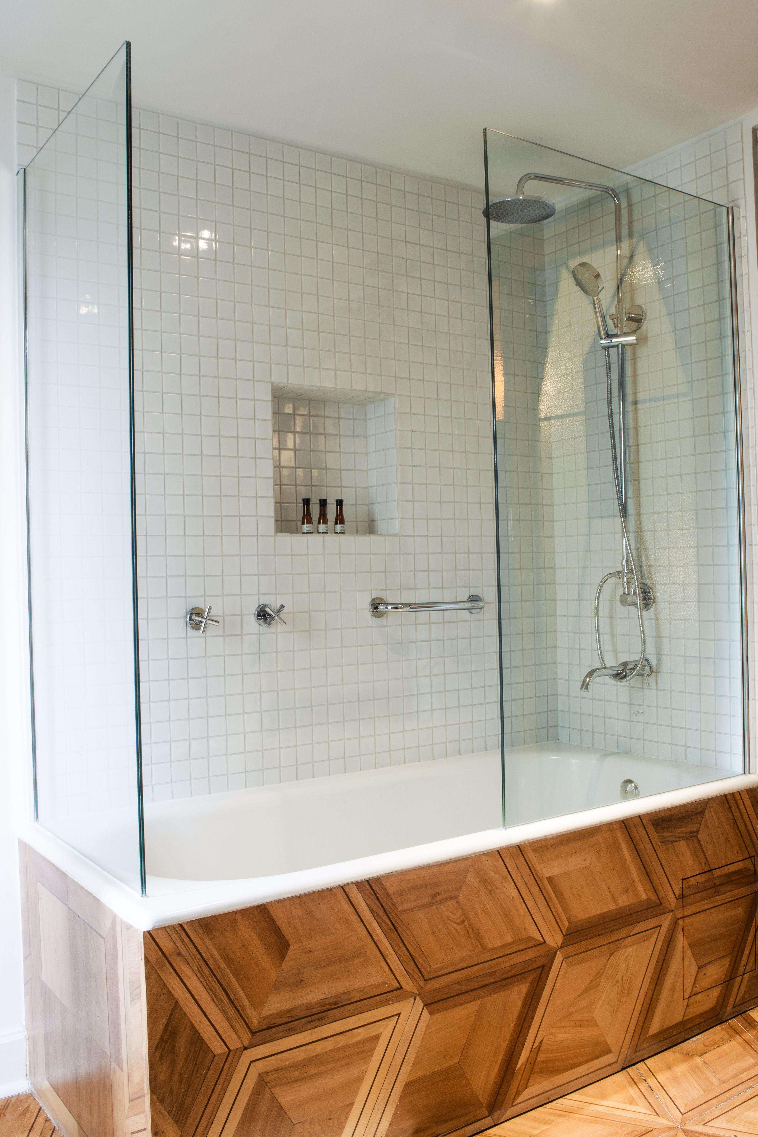 deluxe double room | bathroom | rainfall showerhead, designer toiletries, hair dryer, bathrobes