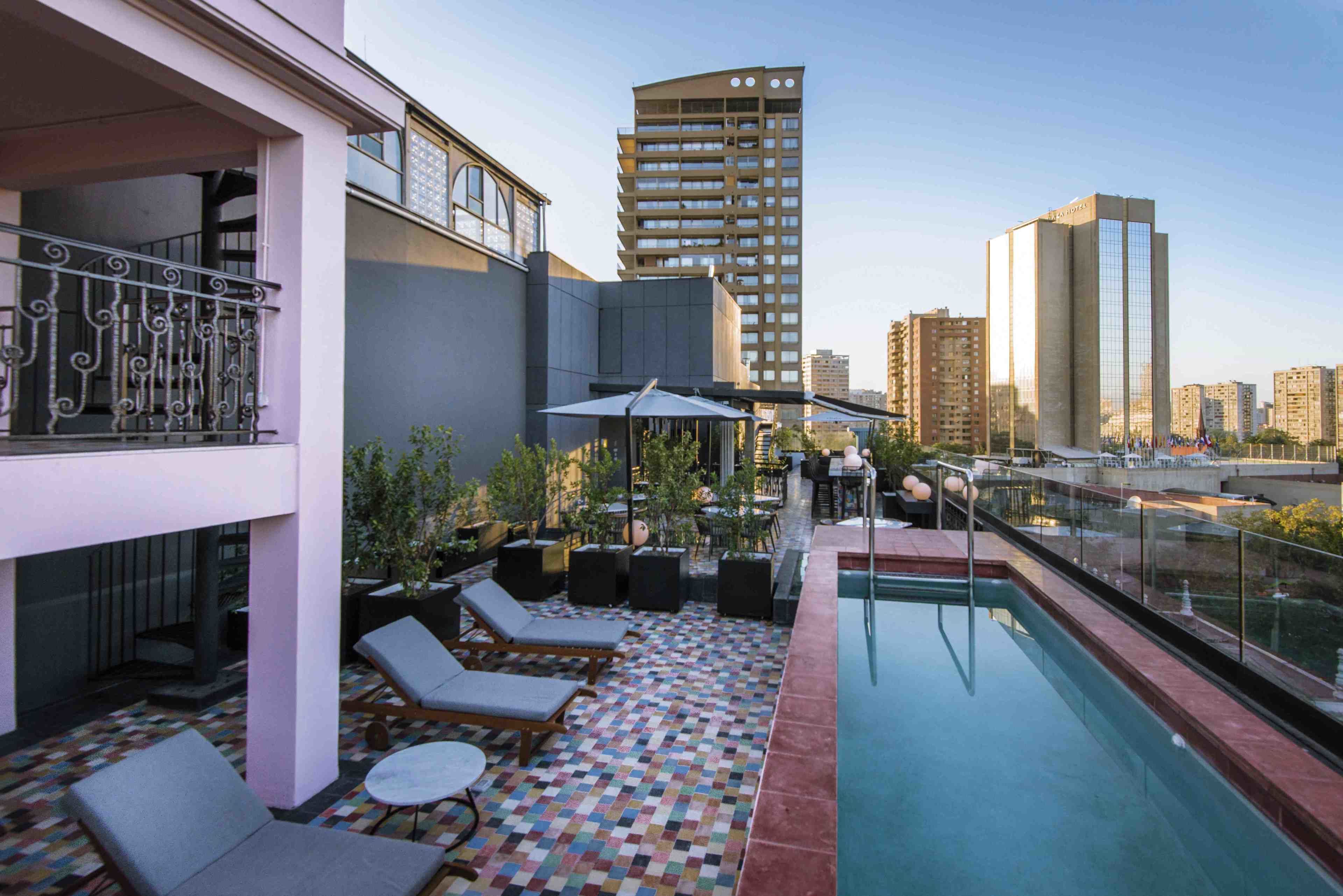 outdoor pool, pool umbrellas, pool loungers