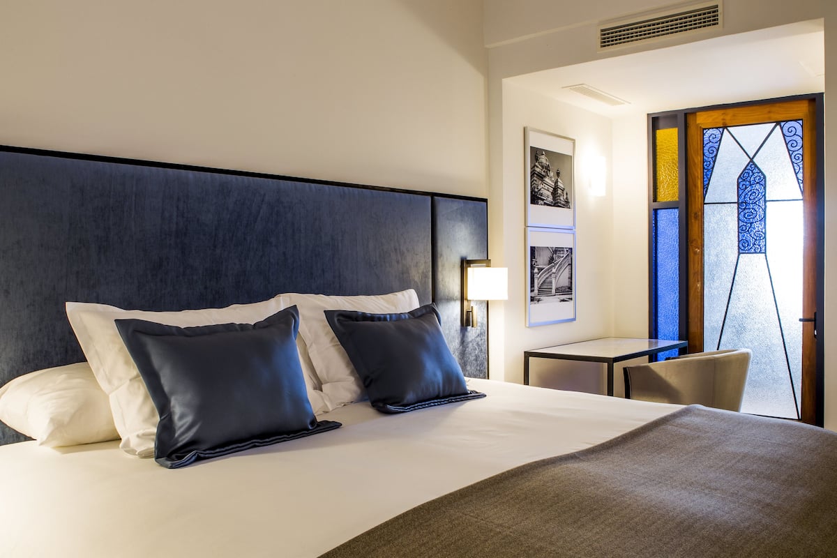 deluxe double room | premium bedding, in-room safe, individually decorated