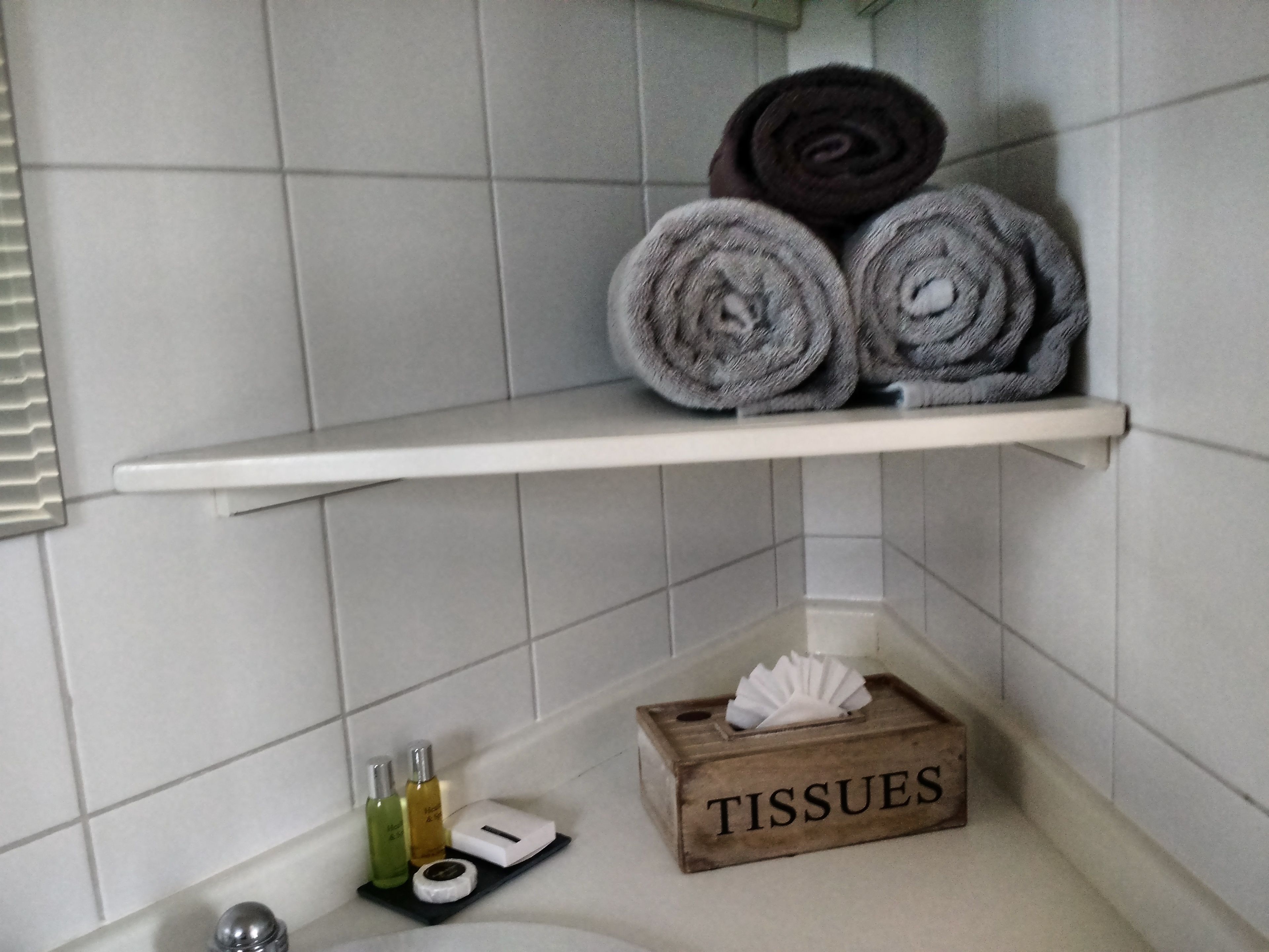 twin room | bathroom | designer toiletries, hair dryer, bathrobes, slippers
