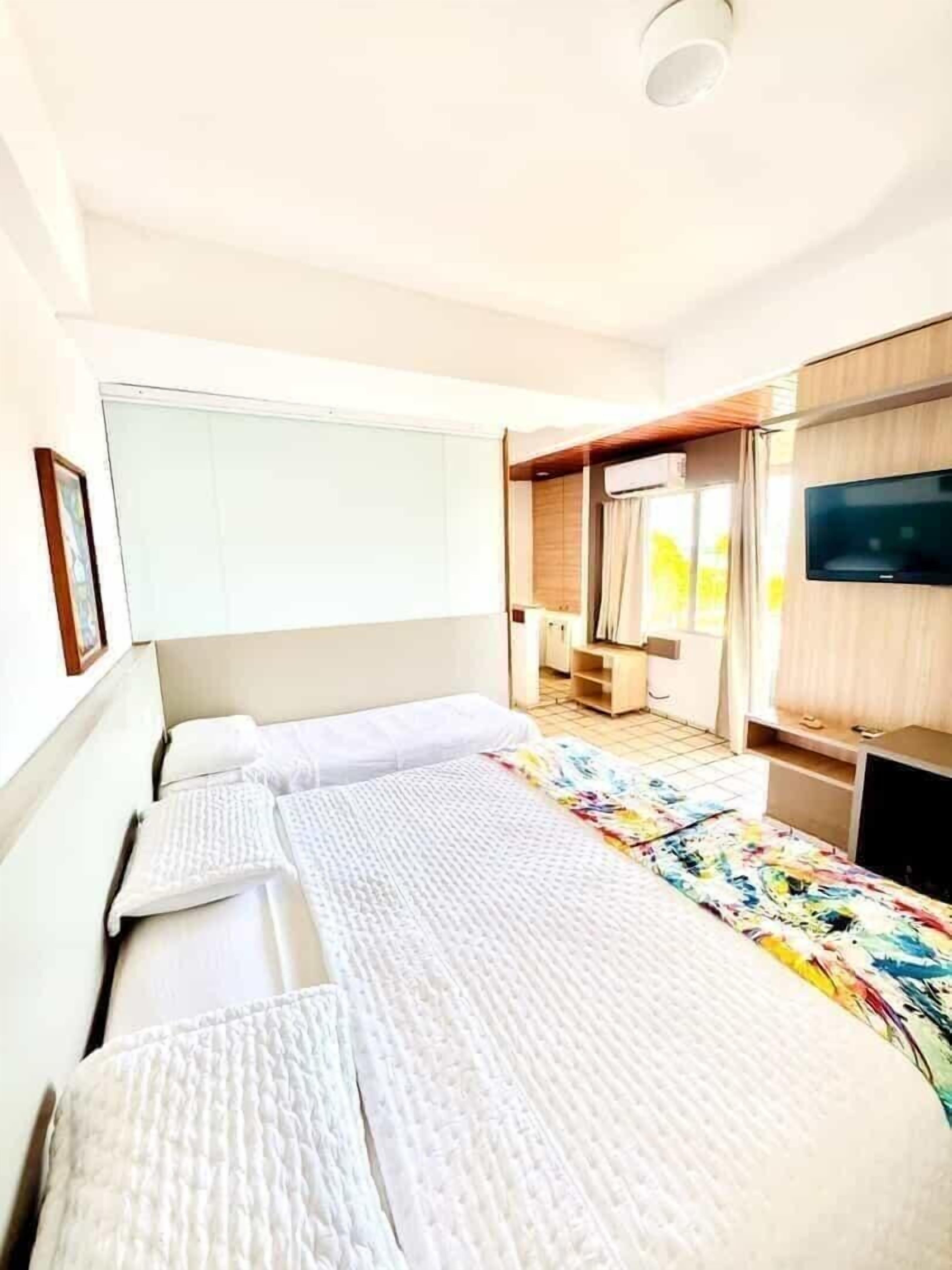 Frigobar, escrivaninha, cortinas blackout, Wi-Fi de cortesia