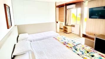 Standard Triple Room | Minibar, desk, blackout drapes, free WiFi