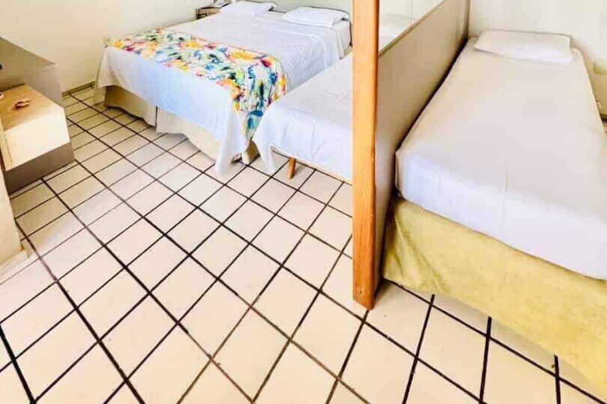 Standard Quadruple Room | Minibar, desk, blackout drapes, free WiFi