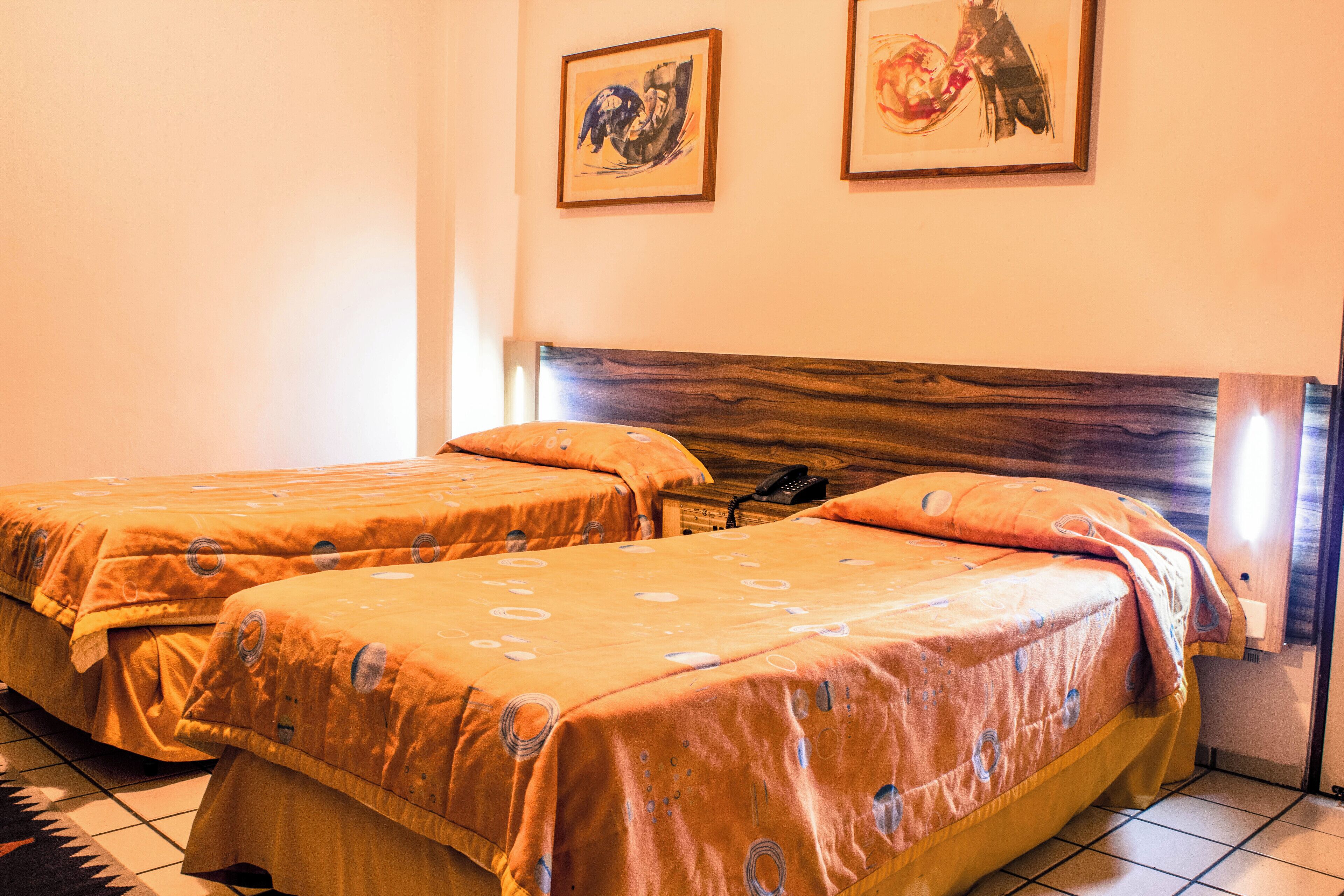 standard quadruple room | 1 bedroom, minibar, desk, blackout curtains