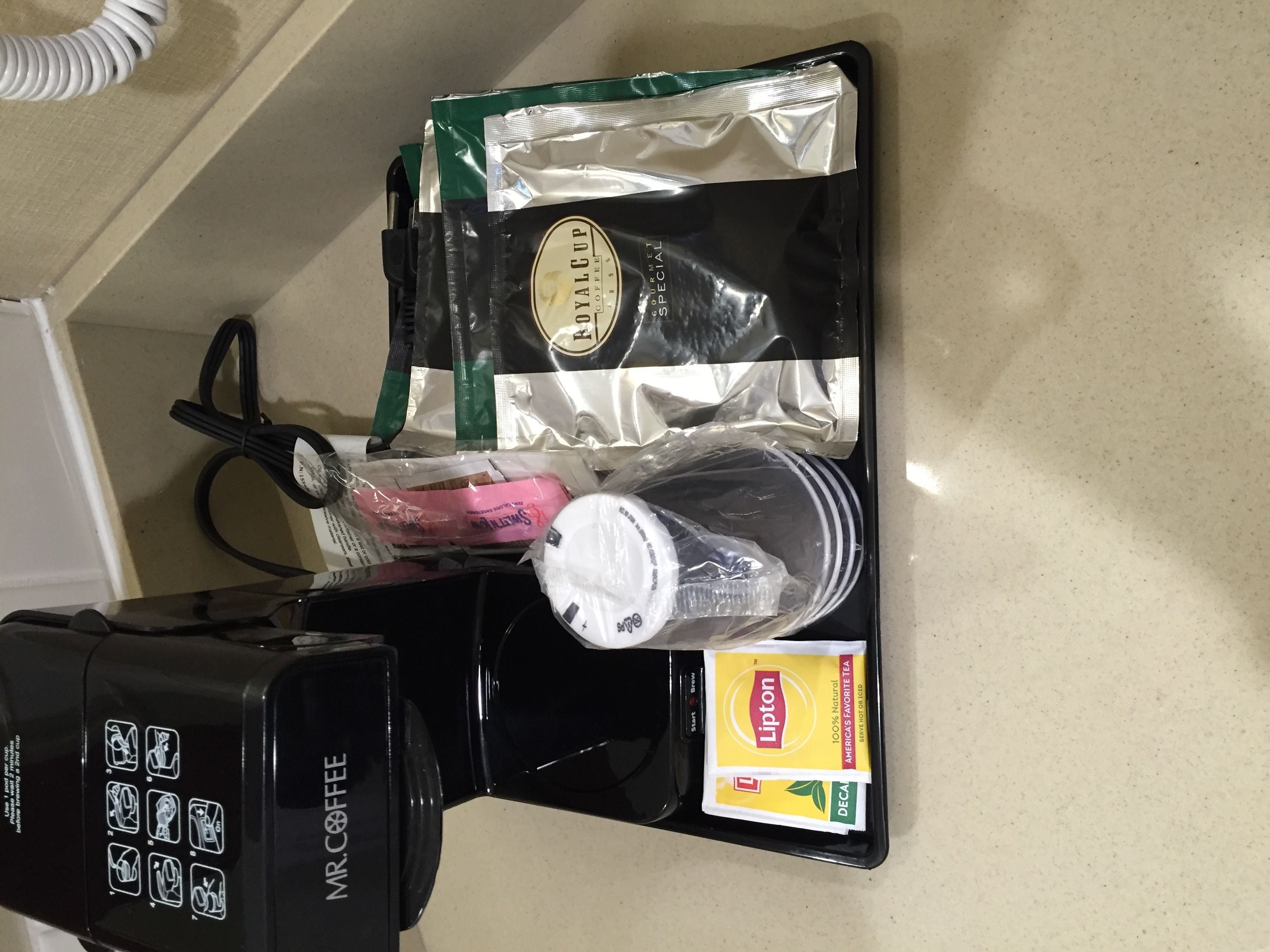 hypo-allergenic bedding, desk, laptop workspace, blackout curtains