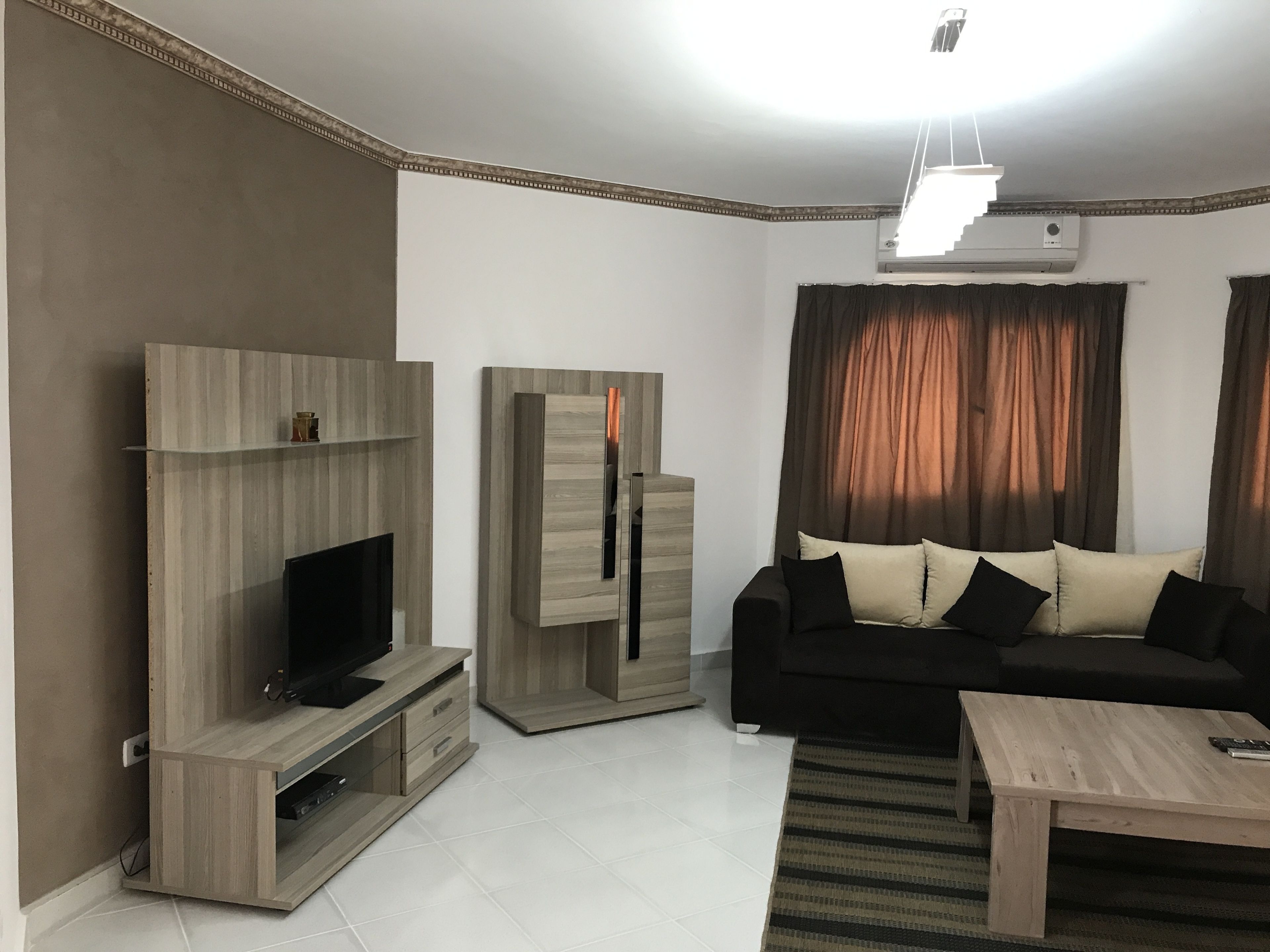 standard apartment, 1 bedroom, 406 | living room | 32-inch tv with satellite channels