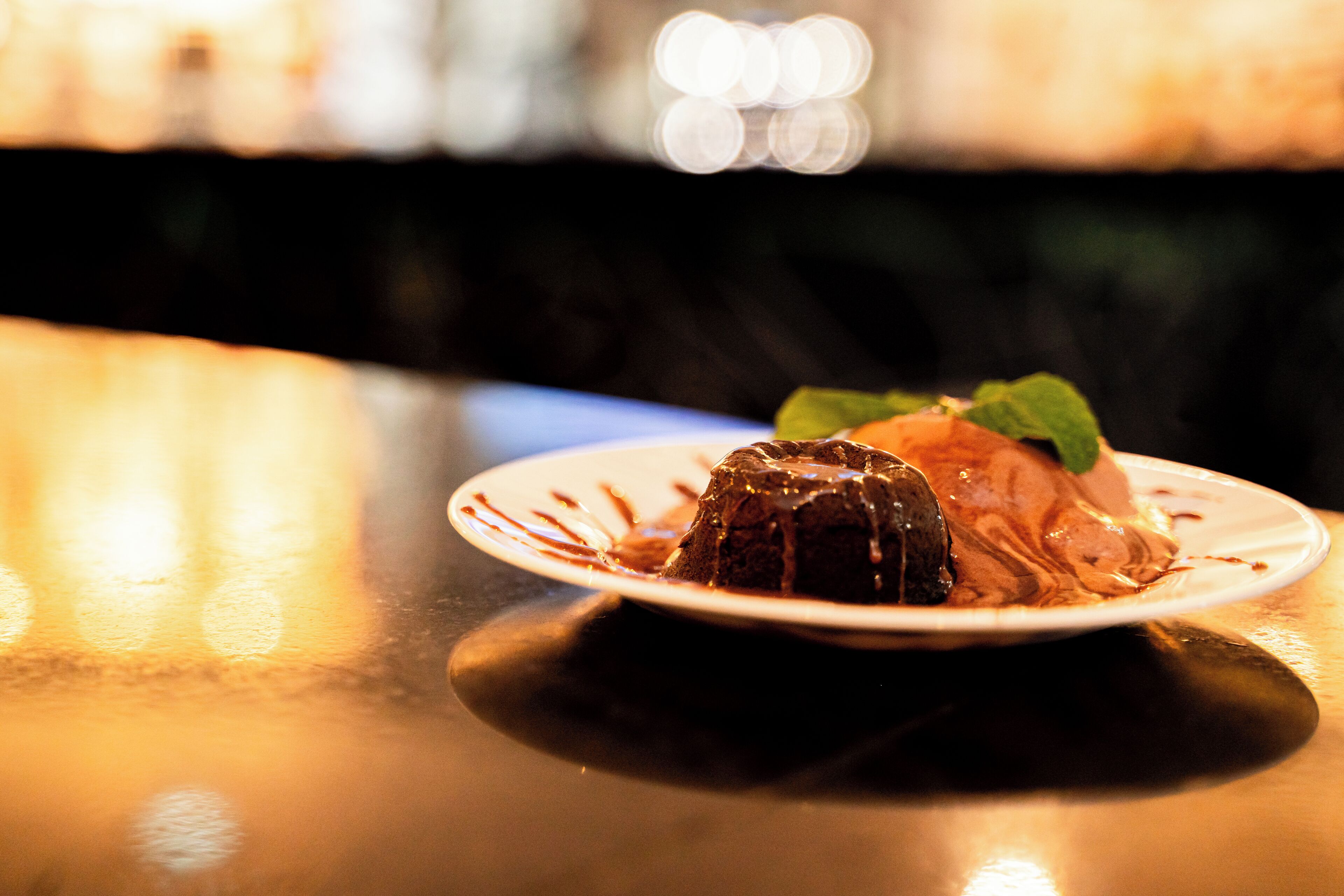 A dessert on a plate with a blurred background.
