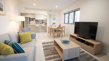 Two Bedroom Apartment | Living area | 50-inch flat-screen TV with digital channels, TV, Netflix