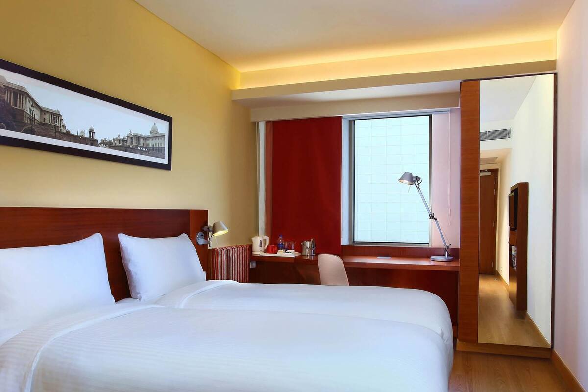 Premium bedding, memory foam beds, in-room safe, desk