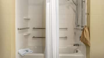 Quarto standard, 1 cama King | Banheiro | Chuveiro/banheira combinados, produtos de toalete grátis