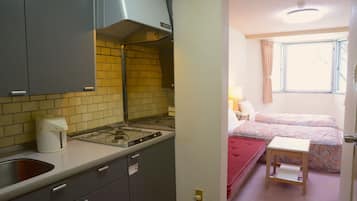 Fridge, stovetop, cookware/dishes/utensils