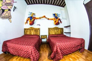 Quarto quádruplo, 2 camas de casal | Vista do quarto