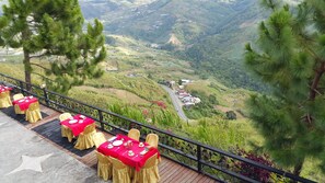Enjoy al fresco dining with breathtaking views of the valley and surrounding mountains.