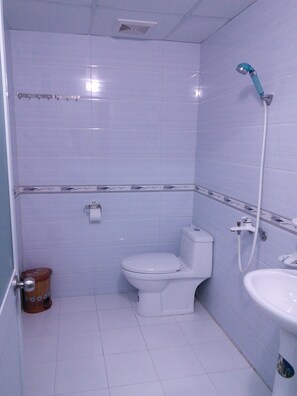 Shower, free toiletries, slippers, towels
