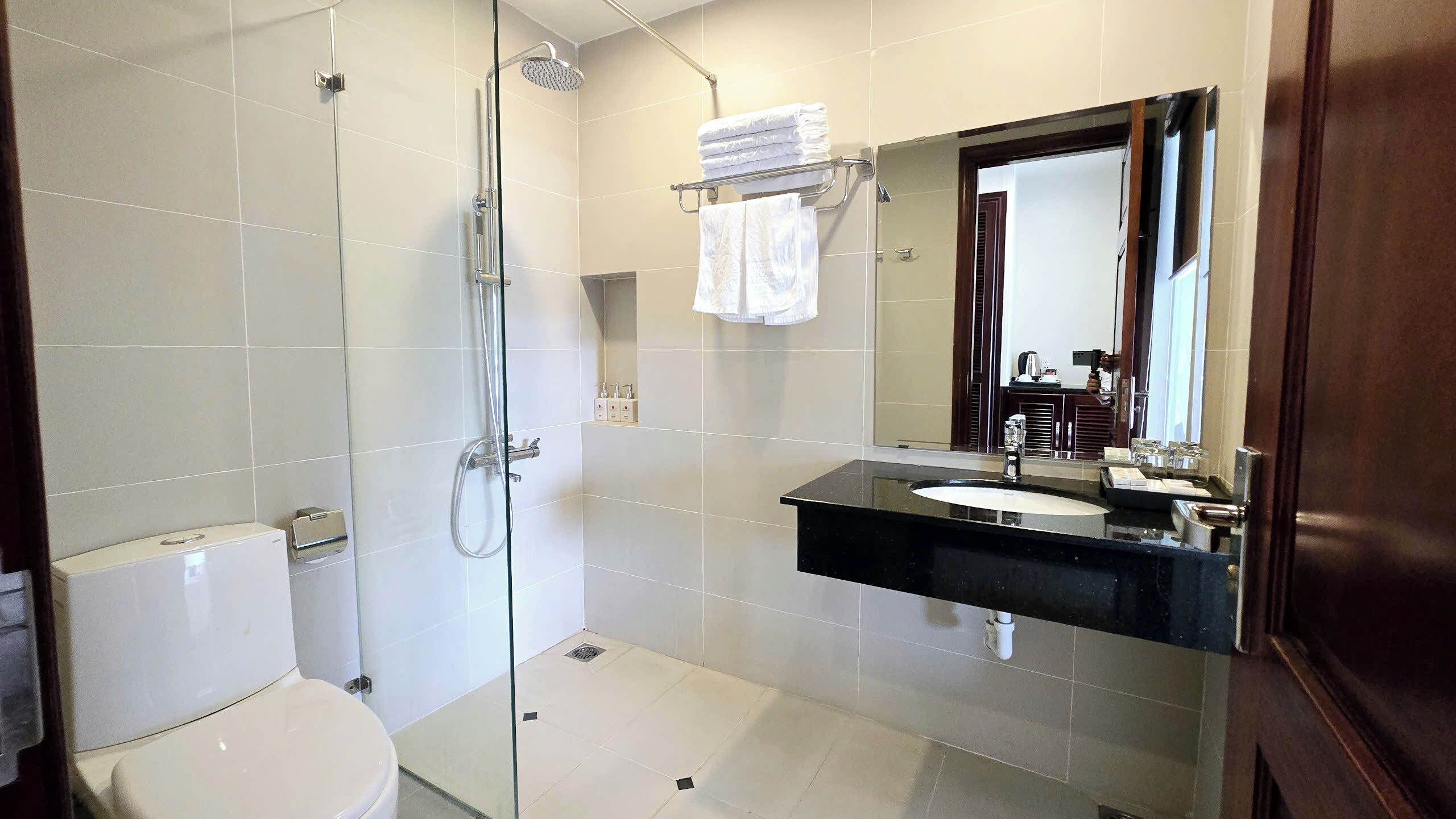 family quadruple room | bathroom | shower, rainfall showerhead, free toiletries, hair dryer