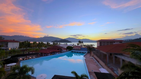 Deluxe Room Pool View w/ Balcony | View from room. Whiterock Beach Hotel + Waterpark