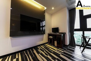 Habitación Deluxe | Escritorio, sistema de insonorización, wifi gratis y ropa de cama