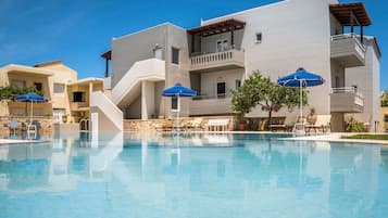 Outdoor pool, pool umbrellas, pool loungers