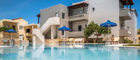 Outdoor pool, pool umbrellas, pool loungers