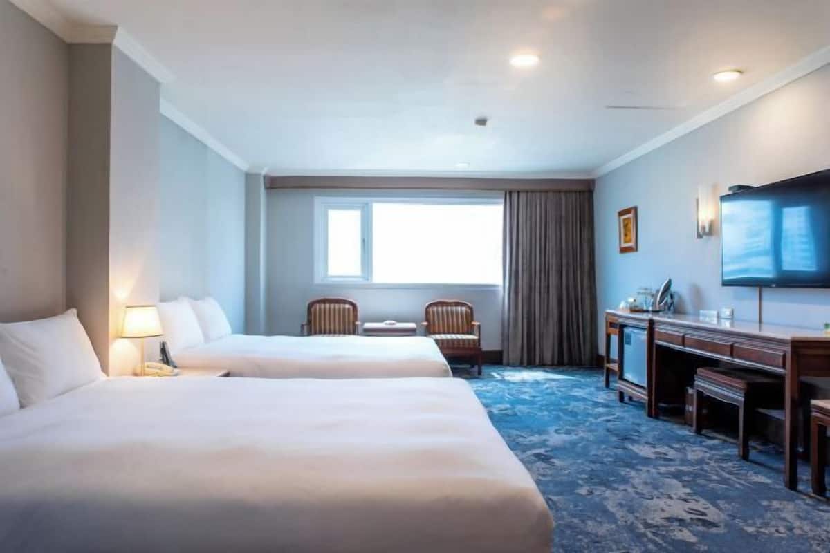 Premium bedding, laptop workspace, blackout drapes, iron/ironing board