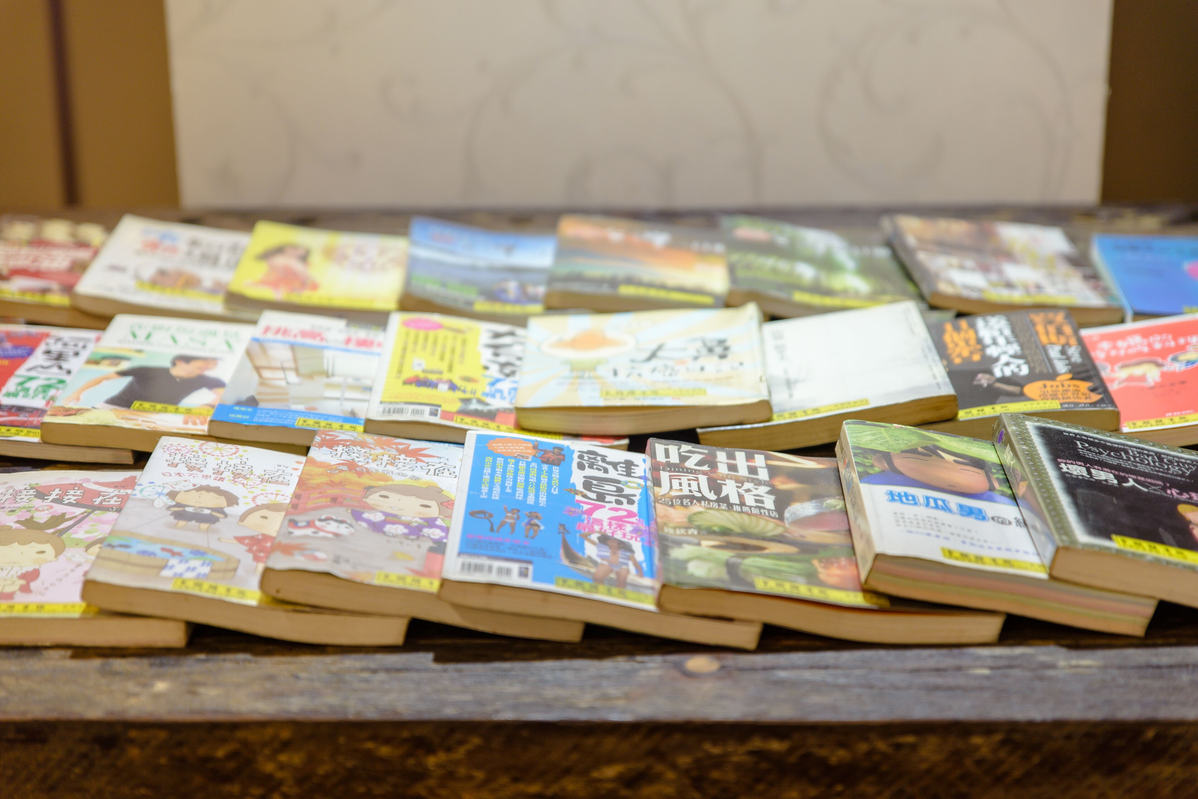 A collection of books on wooden stands.