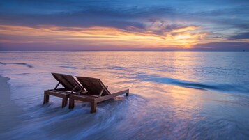 Playa privada y submarinismo