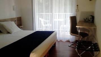 Habitación Confort con 1 cama matrimonial o 2 individuales | Ropa de cama de alta calidad y caja de seguridad en la habitación