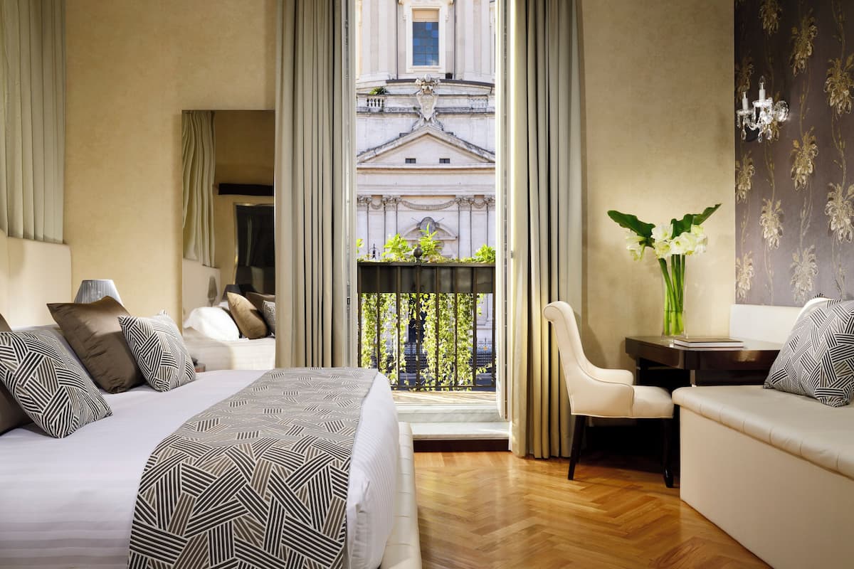 Suite, balcón, vistas a la ciudad | Ropa de cama de alta calidad y edredones de plumas