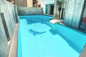 Outdoor pool, sun loungers