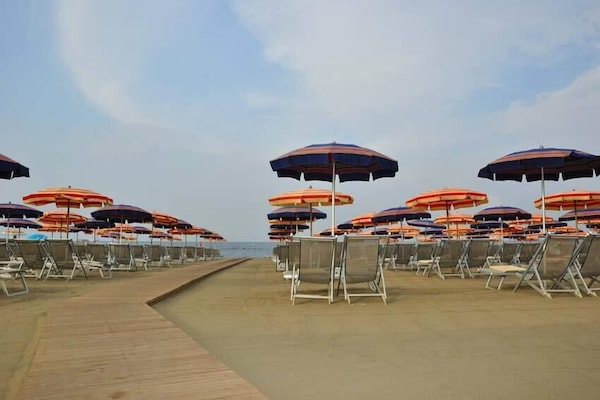 Private beach nearby, sun loungers, beach umbrellas, beach volleyball