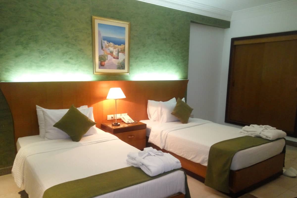 Minibar, in-room safe, blackout curtains, rollaway beds