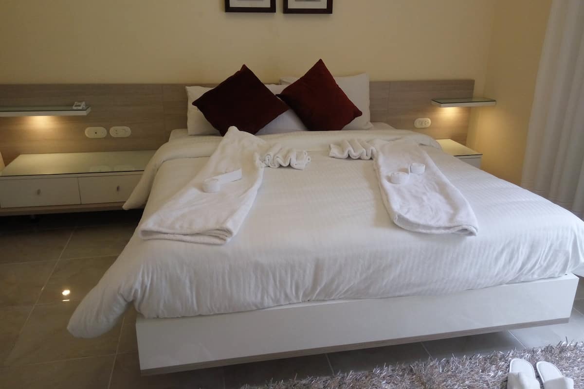 Minibar, in-room safe, blackout curtains, rollaway beds