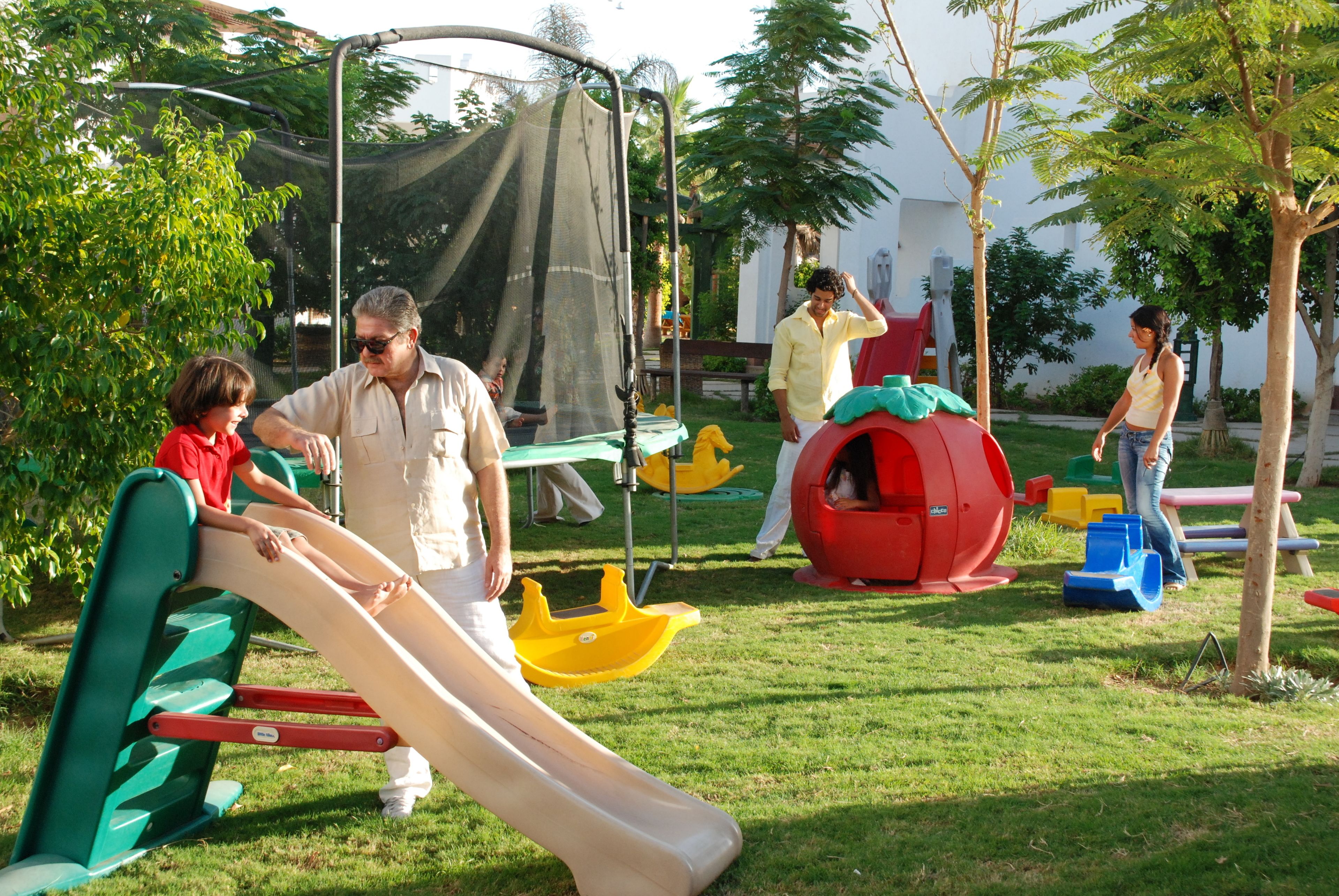 A playground with slides and climbing structures.