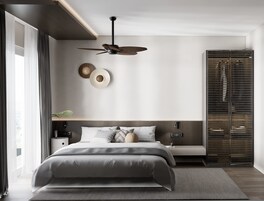 Un dormitorio moderno con cama, mesitas de noche, ventilador de techo y armario.