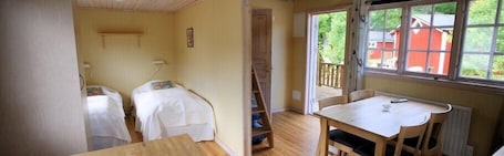 Cottage, 2 bedrooms (sheets/cleaning not included) | Living area | 32-inch TV with satellite channels. Pensionat Lövängen