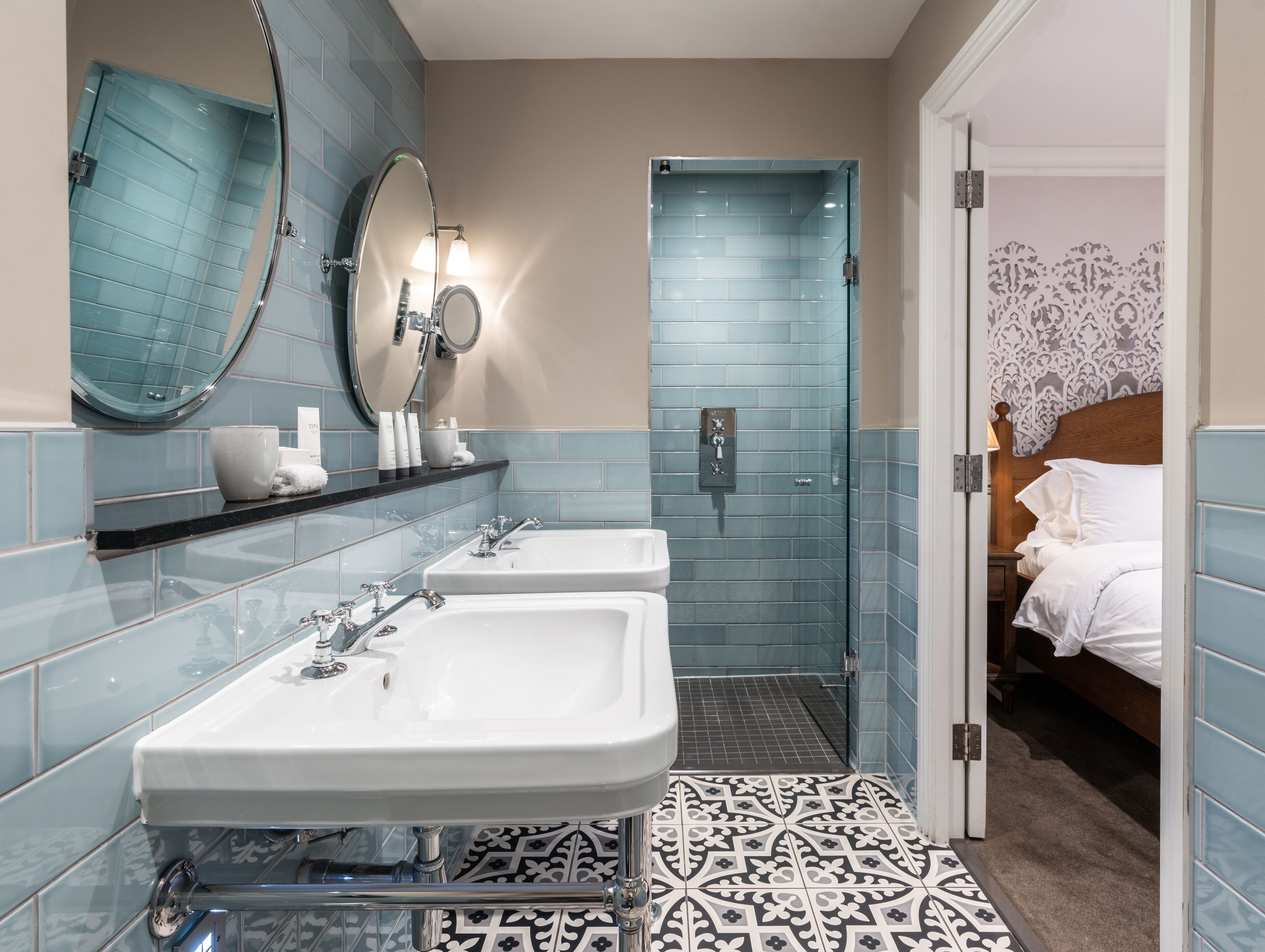 luxe junior suite | bathroom | designer toiletries, hair dryer, bathrobes, towels